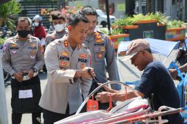 Polres Madiun bagikan 1.500 sembako untuk warga terdampak kenaikan BBM