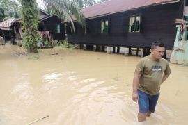 Curah hujan tinggi sungai Batang Serangan Langkat meluap