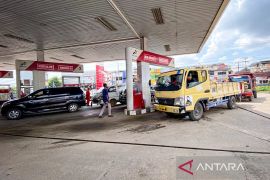 Sensor bahan bakar & optimasi rute hemat BBM 10 persen