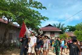 Satgas Yonarhanud 3/Yby-pemuda-siswa Halmahera Utara gelar karnaval budaya