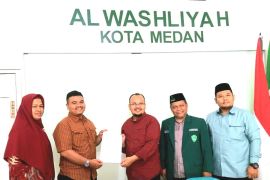 Cut Putri Elda Vivi Bach Kepsek terpilih SMP Al Washliyah 8 Medan