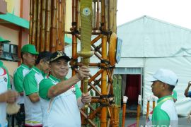 Kirab api obor Porprov XI Kalsel tiba di Kabupaten HSS