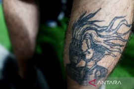 Fan Timnas Argentina antre untuk dapatkan tato Messi