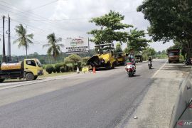 Perbaikan Jalan Lintas Sumatera Jelang libur Natal dan Tahun Baeu Page 1 Small