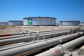 Harga minyak turun karena dolar AS menguat setelah aksi ambil untung