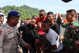 Dua anggota Koramil 1709-05 Barapasi meninggal akibat perahu motor tenggelam