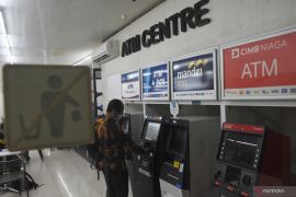 OJK minta perbankan pastikan layanan ATM lancar saat cuti bersama