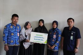 BPJS Ketenagakerjaan serahkan manfaat JKK meninggal PPKH Bojonegoro