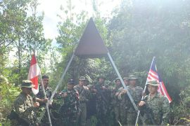 TNI dan TDM patroli bersama cek patok perbatasan