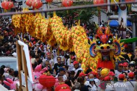 Prosesi Naga Buka Mata menjelang perayaan Cap Go Meh