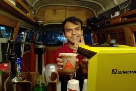 Cara Rivaldi mempromosikan kopi Papua