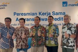 Lindungi Jiwa Debitur, Bank Mandiri Taspen dan AXA Mandiri jalin kerja sama