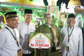 Awalnya satu hari satu halaman, Rizqi Mubarok  Juara 1 Hafidz 30 Juz