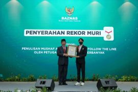 Penulisan Al Quran oleh 1.000 amil Baznas raih rekor Muri