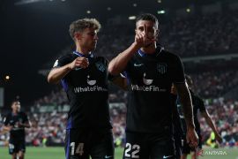 Atletico Madrid kalahkan 10 pemain Rayo Vallecano 2-1