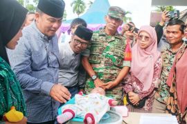 Pj Bupati Tapteng launching gerakan PMT terhadap Baduta secara serentak