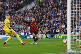 Pep Guardiola: City optimistis rebut "treble"