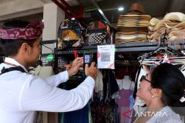 Sepekan, kurs rupiah sampai BI ajak gunakan QRIS