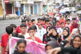 Ratusan warga Ternate jalan pagi dukung laga Indonesia lawan  Argentina