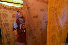 Pelatihan membatik perempuan AMAN Osing