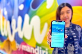 Bank Mandiri genjot kepemilikan kendaraan listrik lewat Kopra & Livin'