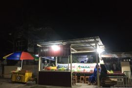 Penasaran dengan nasi kuning khas "kelapa goreng" ibu Mawar