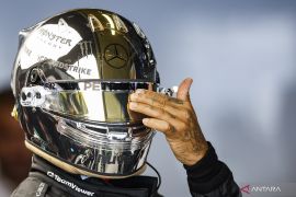Helm kinclong Lewis Hamilton di GP Jepang