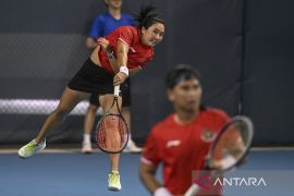 Tenis ganda campuran melaju ke babak perempat final