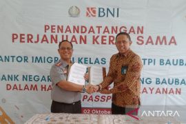 Imigrasi kerja sama BNI Kota Baubau permudah pelayanan pengurusan paspor