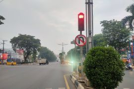 Hujan deras belum enyahkan kabut asap di Banjarmasin