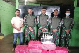 Satgas Pamtas Berhasil Gagalkan Penyelundupan Miras Asal Malaysia