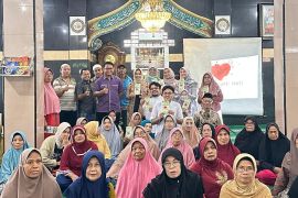 Tim pengabdian IKM-KK Unand luncurkan kartu kontrol bagi penderita hipertensi