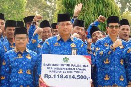 Civil servants in South Sumatra's OKU Timur donate money to Palestine