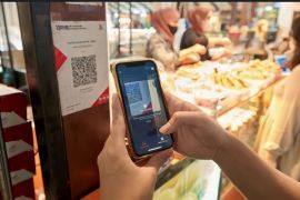 Penggunaan QRIS dalam transaksi digital permudah masyarakat dan UMKM di Indonesia