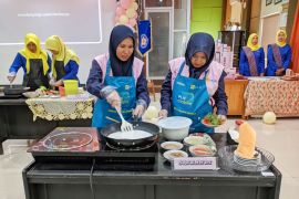 PLN Payakumbuh, "marandang jo kompor induksi"