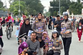 Polwan Ditlantas Polda Riau ajak masyarakat wujudkan pemilu damai