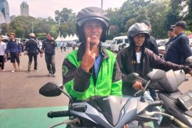 Menantu Presiden Jokowi hadiri kampanye Prabowo-Gibran dengan ojek online