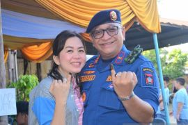 Pemilu Serentak 2024, Sekdako Padang dan Istri Gunakan Hak Pilih di TPS 1 Rimbo Kaluang