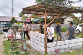 Bhabinkamtibmas ikut serta dalam Satgas TMMD Kodim Banjarmasin