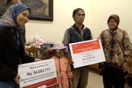 Mensos Risma salurkan bantuan untuk menopang BPJS Kesehatan