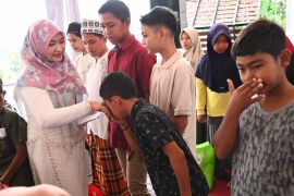 TP PKK Aceh Besar santuni 40 anak yatim