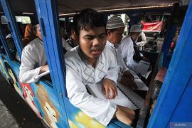 Khataman Al Quran braille di atas kereta kelinci