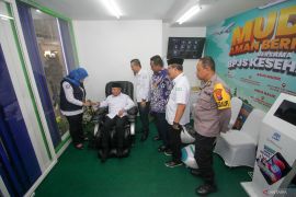 Posko mudik BPJS kesehatan di Terminal Purabaya