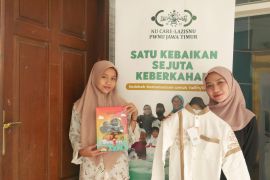 Lazisnu Jatim bagi-bagi baju Lebaran gratis