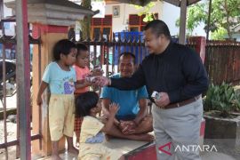 Senyum indah dari balik susu gratis dari Bupati Tapsel