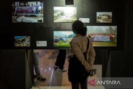 Pameran foto Hari Anti Tambang di Palu Page 1 Small