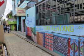 Berkat BRI, Klaster Usaha Kain Tuan Kentang Palembang naik kelas