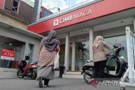 Menumbuhkan pengalaman perbankan, daerah maju bersama gurita inovasi "Fintech"