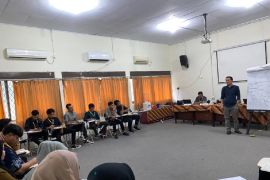 Rektor Unja beri materi di latihan Kader HMI tingkat nasional