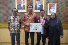 Bikin bangga, Yidha bocah desa asal OKI juara kompetisi matematika tingkat dunia